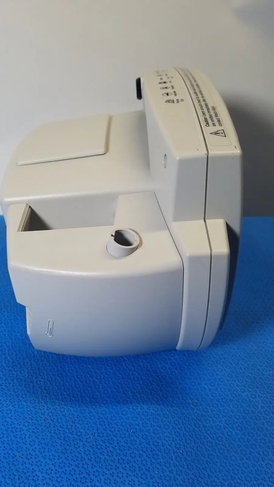 White plastic welch allyn 530t0 vital signs monitor with rectangular shape and circular port on the front panel