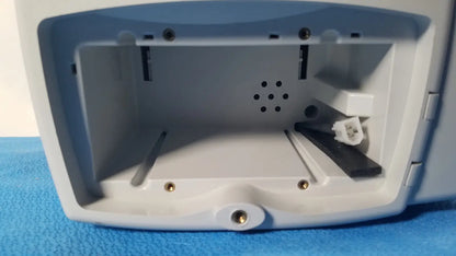 White plastic welch allyn 530t0 vital signs monitor with hinged lid, internal compartments, and mounting holes