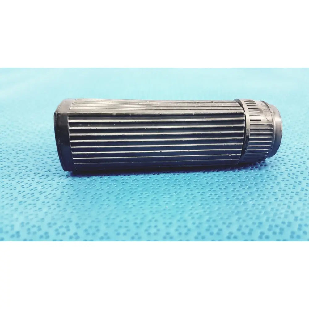 Black cylindrical welch allyn rectal light handle with ribbed texture and threaded end for medical examination illumination