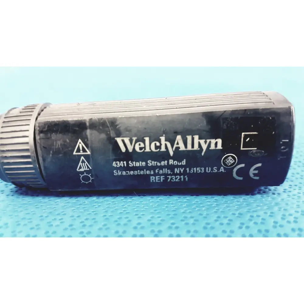 Black welch allyn rectal light handle with ribbed texture and printed labeling for medical examination illumination