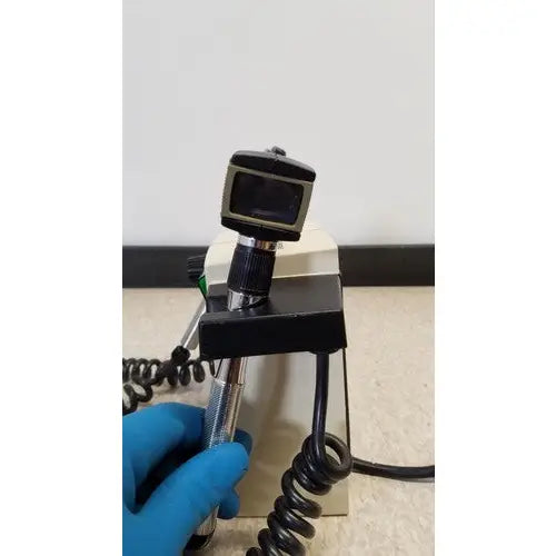 Black and silver welch allyn 74710 transformer diagnostic scope with coiled cable for medical use