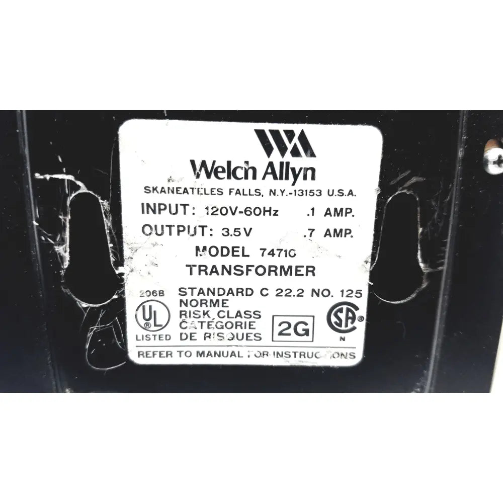 Welch allyn 7471c wall transformer ophthalmoscope otoscope with black casing and white technical specification label