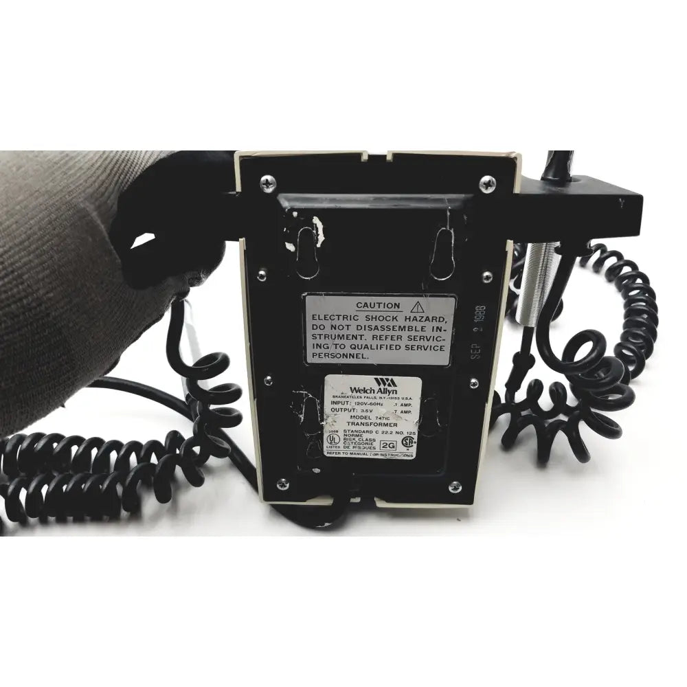 Black welch allyn 147c wall transformer ophthalmoscope otoscope with coiled cables and metal screw-on cover