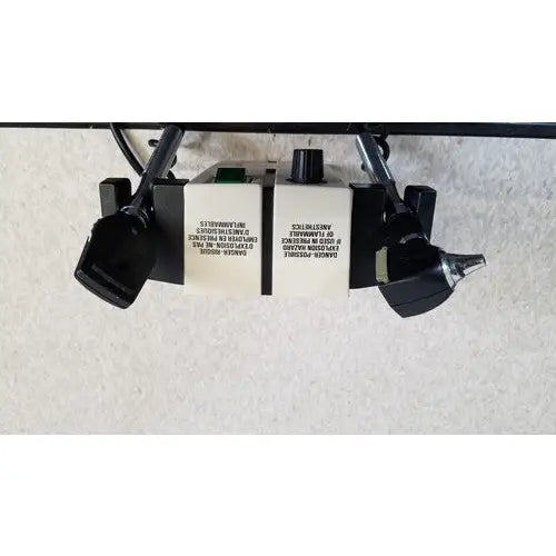 Black and white welch allyn 74710 wall transformer industrial control panel with labeled switches and knobs for reuse medical