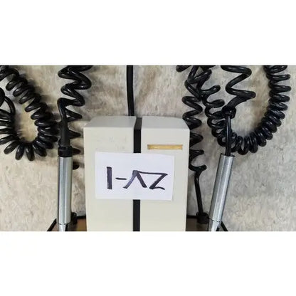 Beige welch allyn 74710 wall transformer with black stripe gold foil and coiled cables for reuse medical devices
