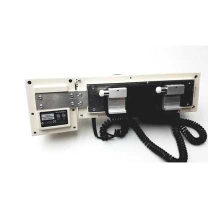 White plastic and metal welch allyn series transformer otoscope ophthalmoscope with black coiled cord labeled wickes-milv
