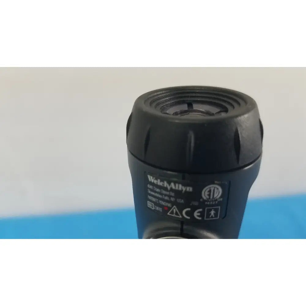 Black plastic welch allyn 4017-2586 tapered tip with textured grip and ridged lens housing for series transformer reuse medical use