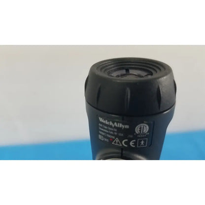 Black plastic welch allyn 4017-2586 tapered tip with textured grip and ridged lens housing for series transformer reuse medical use