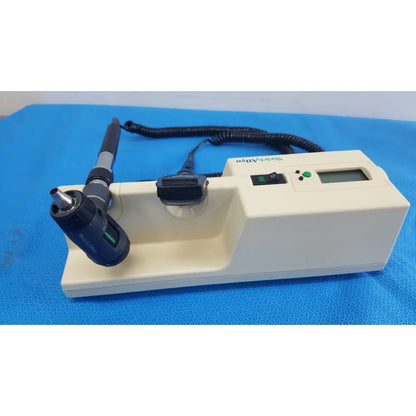 Welch allyn series transformer with otoscope featuring black and gray handle and beige digital base unit for reuse medical use