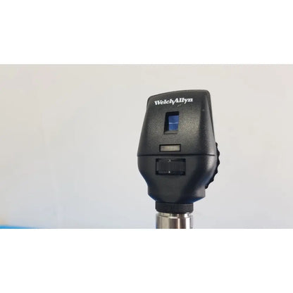Welch Allyn 767 series transformer with otoscope featuring a blue lens and metallic shaft for reuse medical use