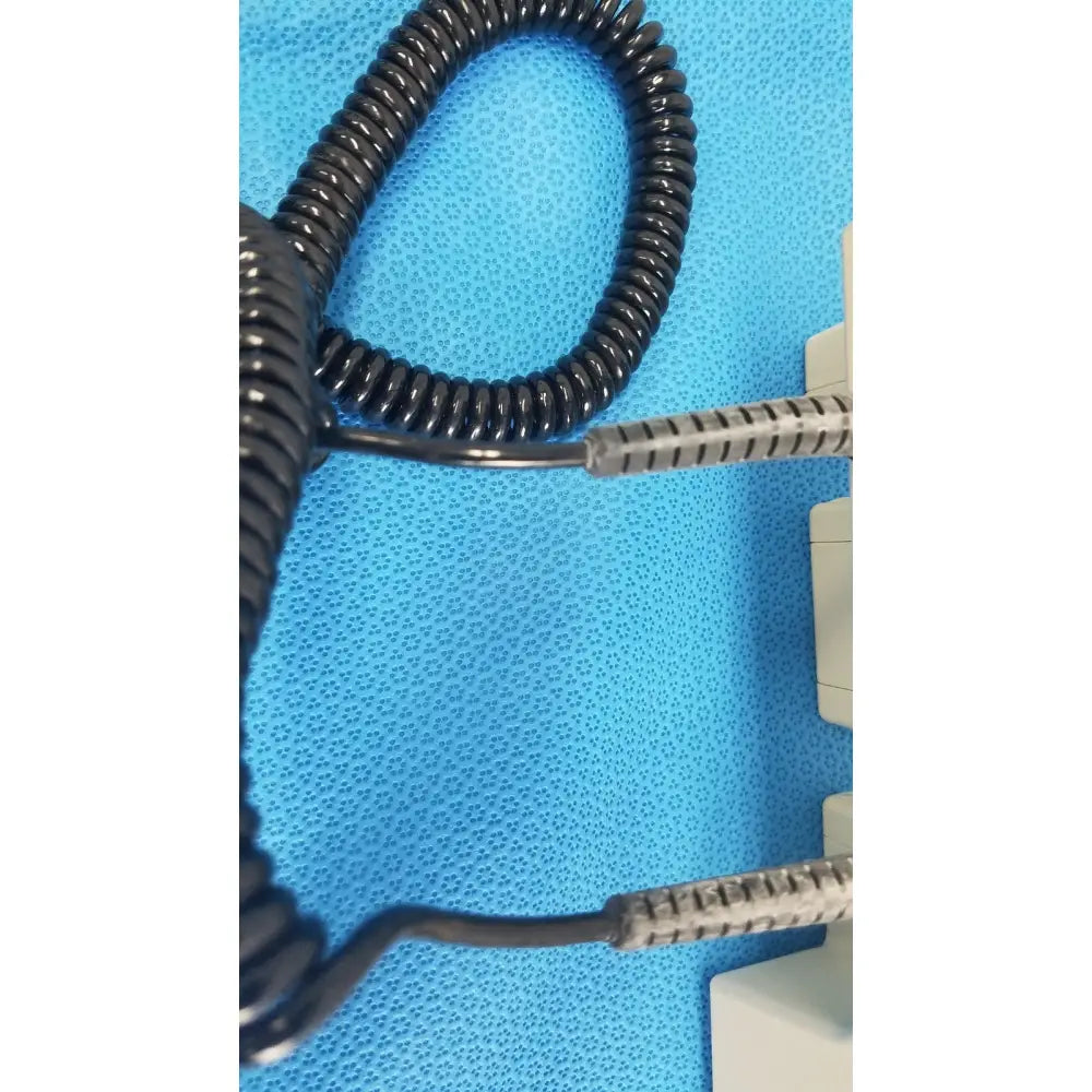 Black coiled cable with metallic ridged connectors for welch allyn 767 series transformer reuse medical device