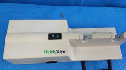 Welch Allyn 767 series wall-mounted diagnostic power transformer in white with green and black branding and two instrument slots