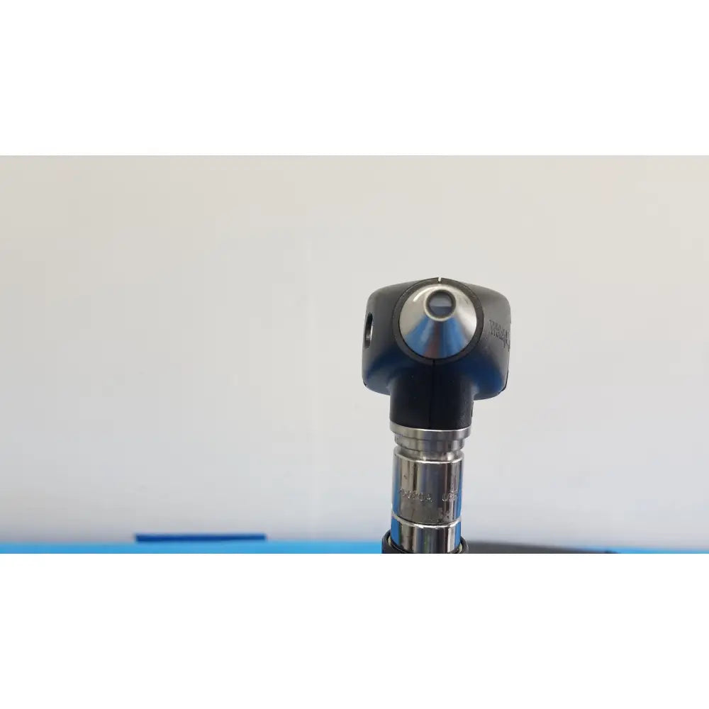 Welch Allyn 767 Series wall transformer with black and silver otoscope featuring a rounded head and central lens