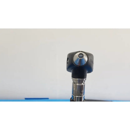 Welch Allyn 767 Series wall transformer with black and silver otoscope featuring a rounded head and central lens