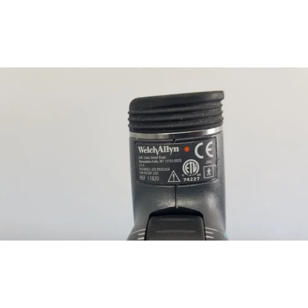 Black welch allyn 767 series wall transformer with textured grip and regulatory labeling for medical use
