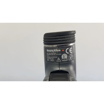 Black welch allyn 767 series wall transformer with textured grip and regulatory labeling for medical use