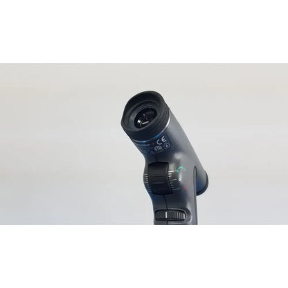Black handheld otoscope with textured grip and adjustable focus dial from welch allyn 767 series wall transformer