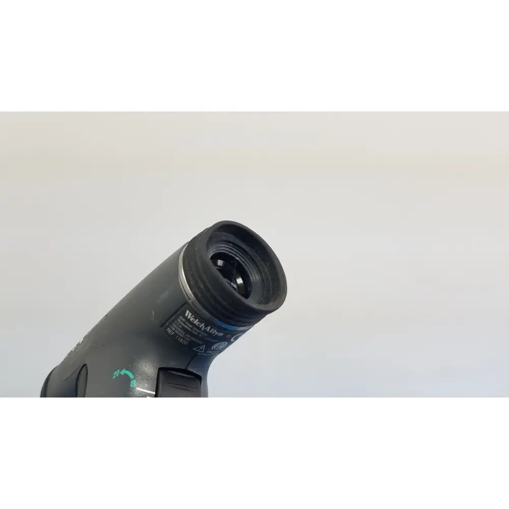 Welch Allyn 767 series wall transformer with black matte otoscope and silver metallic ring for medical use