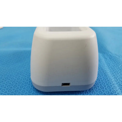 White plastic charging stand with usb port for welch allyn kleenspec cordless led illumination system