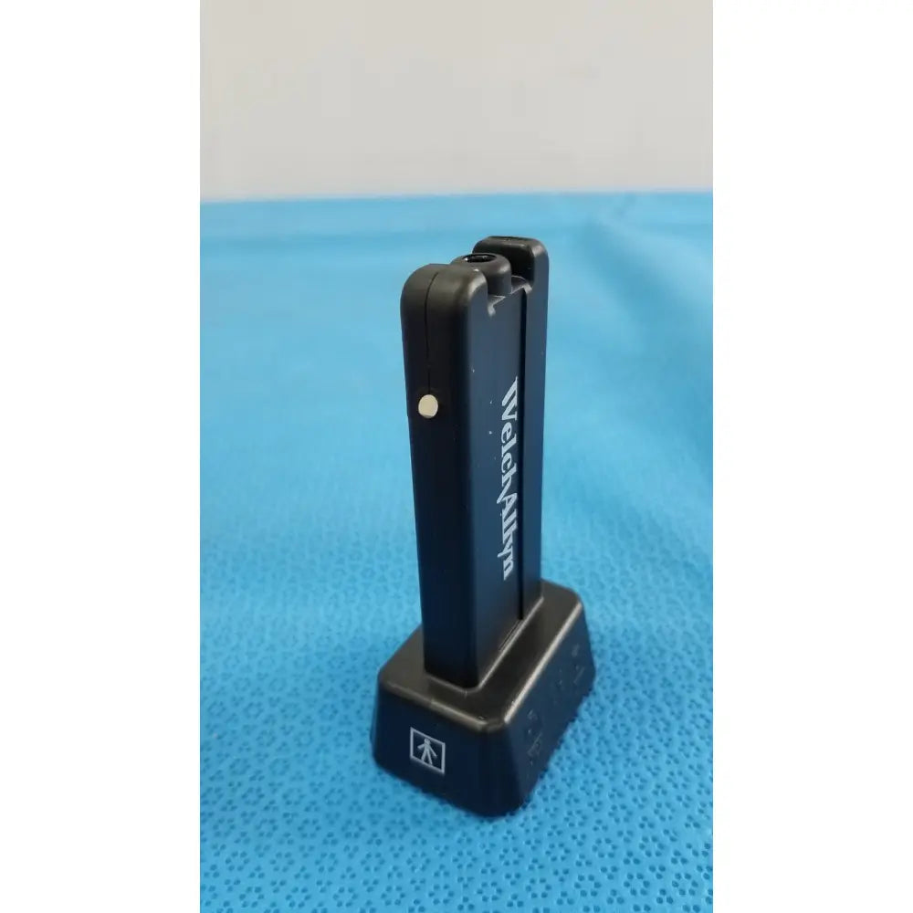 Black welch allyn dual-channel battery charger with matte finish and white branding for kleenspec cordless led illumination system