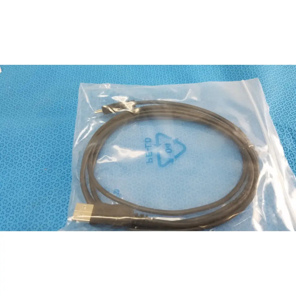 Brown braided usb cable neatly coiled in clear bag for welch allyn kleenspec cordless led illumination system