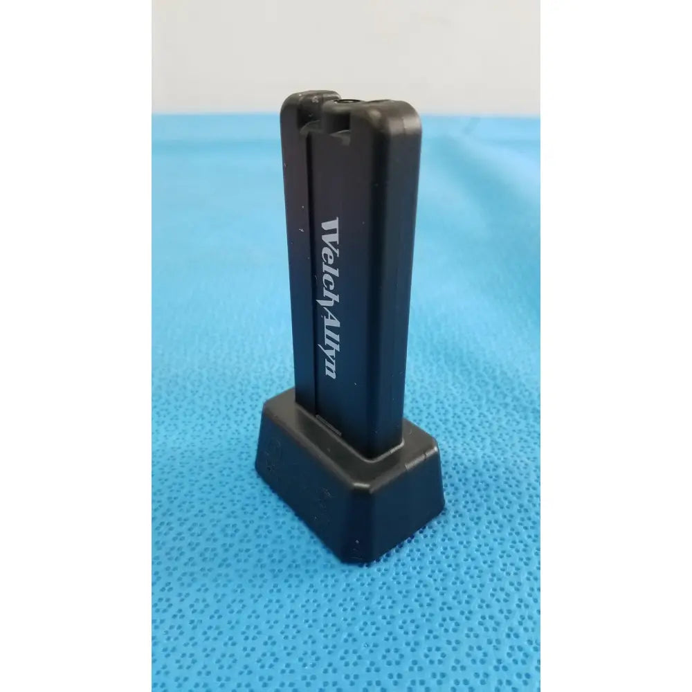 Black plastic watchmy phone stand with rectangular base and vertical support for welch allyn kleenspec cordless led system