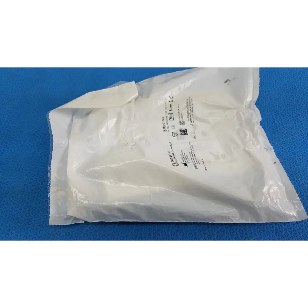 White plastic bag containing welch allyn 901043 small adult 10 blood pressure cuff packaging with regulatory labels and qr code
