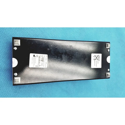Black rectangular welch allyn 9600 plus calibration tester with silver corner mounts and white labeling stickers