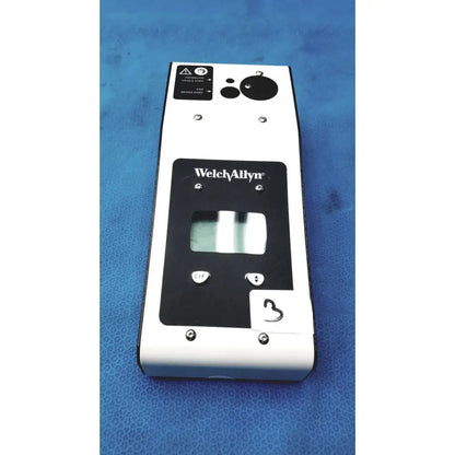 White and black welch allyn 9600 plus calibration tester 901009 with rectangular screen control buttons and circular ports