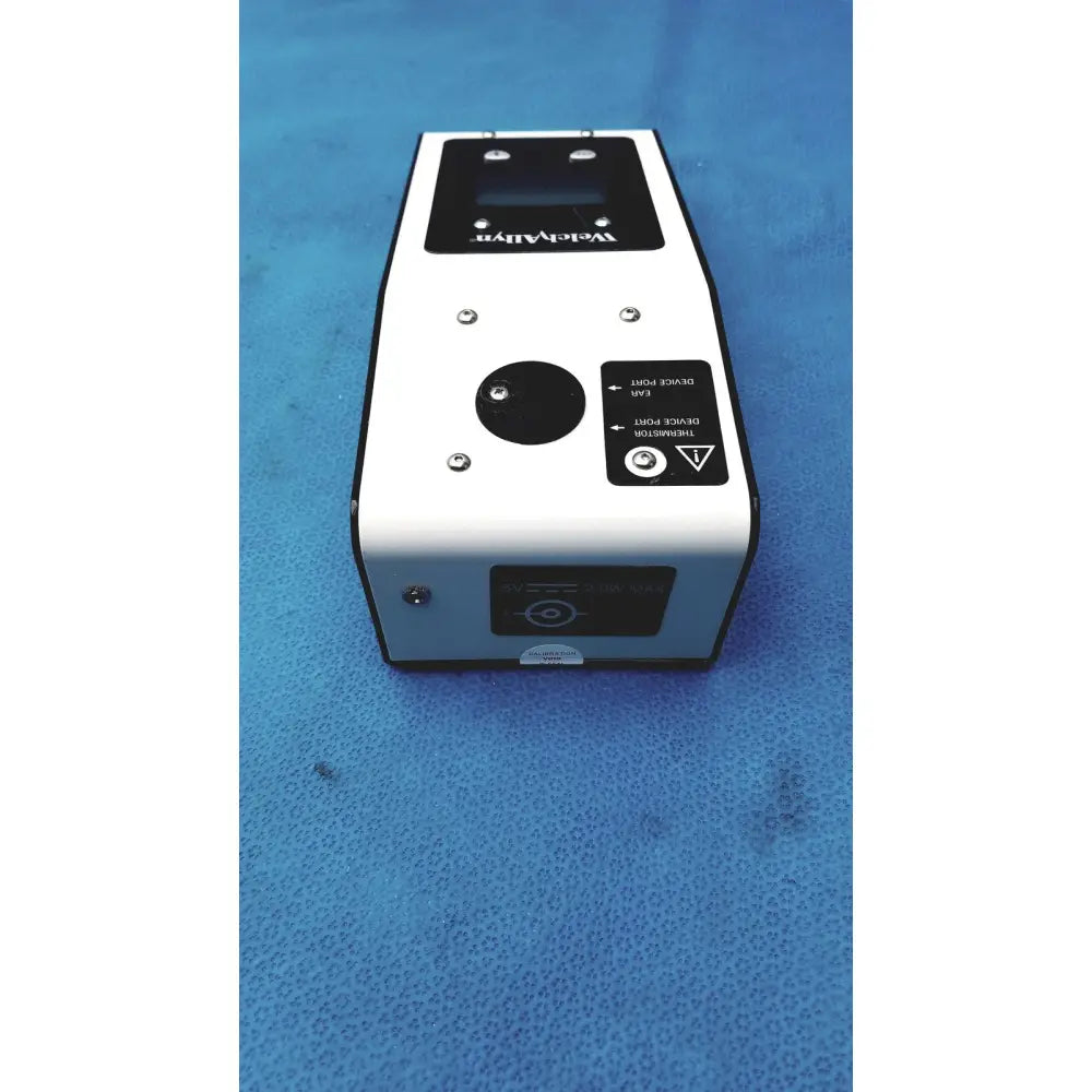 White rectangular handheld welch allyn 9600 plus calibration tester with black weld valve control panel and central circular port