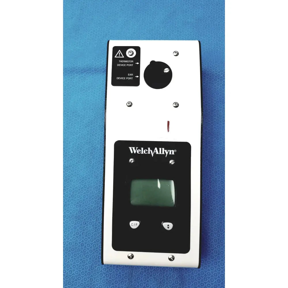 White and black welch allyn 9600 plus calibration tester with digital display, labeled ports, and control buttons
