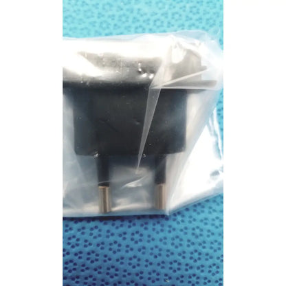 Black plastic eu-style power adapter with gold metal prongs sealed in bag for welch allyn 9600 plus calibration tester