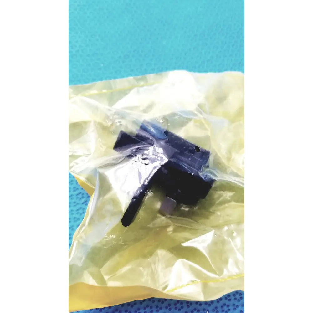 Black plastic electrical switch component in yellow anti-static bag for welch allyn 9600 plus calibration tester adapter