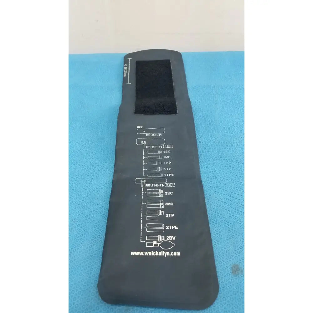 Black welch allyn adult blood pressure cuff with white printed measurement chart and website address visible