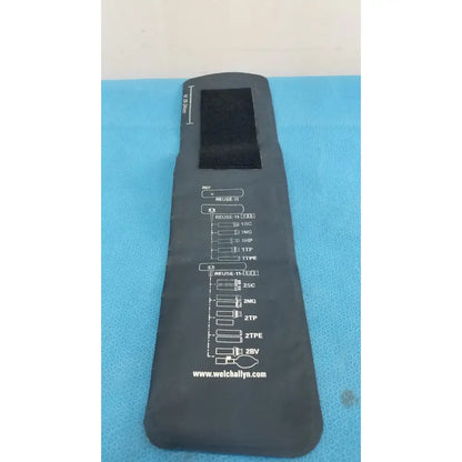 Black welch allyn adult blood pressure cuff with white printed measurement chart and website address visible