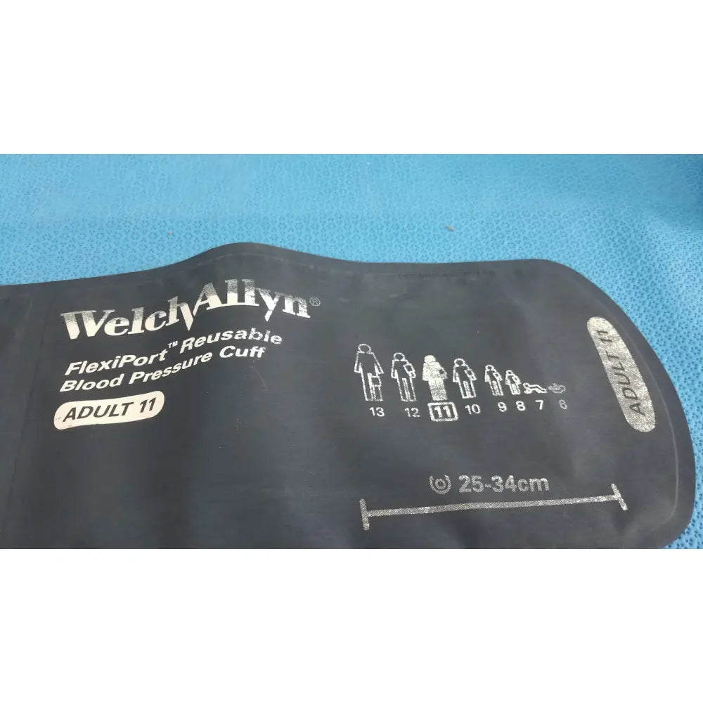 Black welch allyn adult 11 blood pressure cuff made of flexible rubber with printed sizing guide and silhouette icons