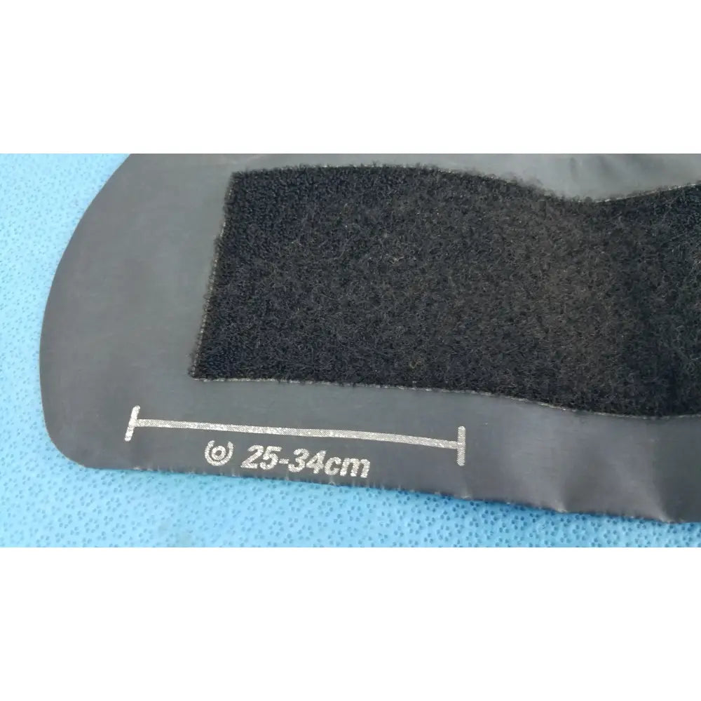 Black rubberized welch allyn adult 11 blood pressure cuff with white measurement markings 25-34 cm and black velcro patch