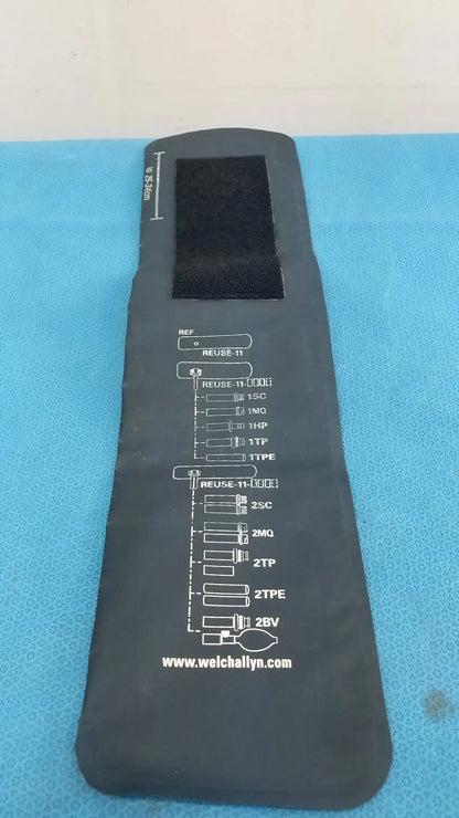Black welch allyn adult blood pressure cuff with white printed measurement chart and website address visible