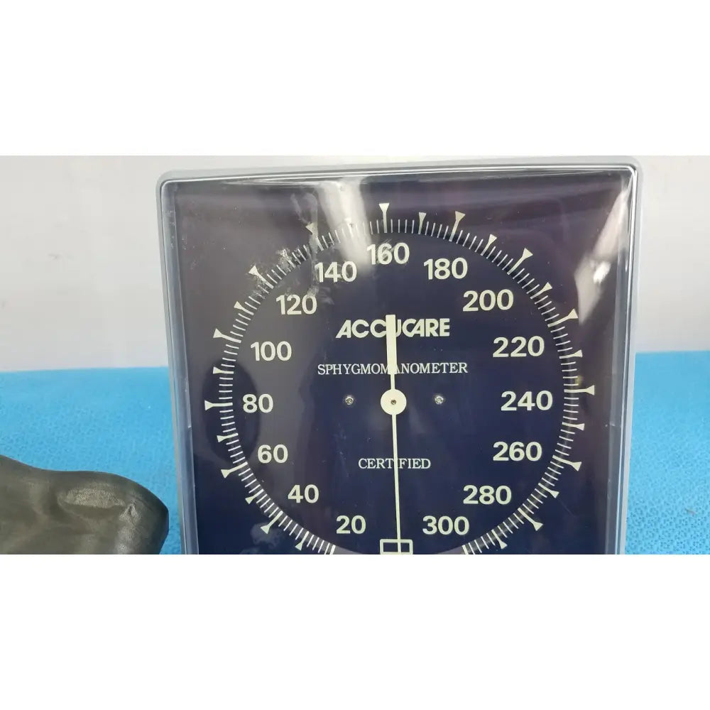Accucare analog sphygmomanometer with black dial and white markings in clear casing for Welch Allyn adult blood pressure cuff use