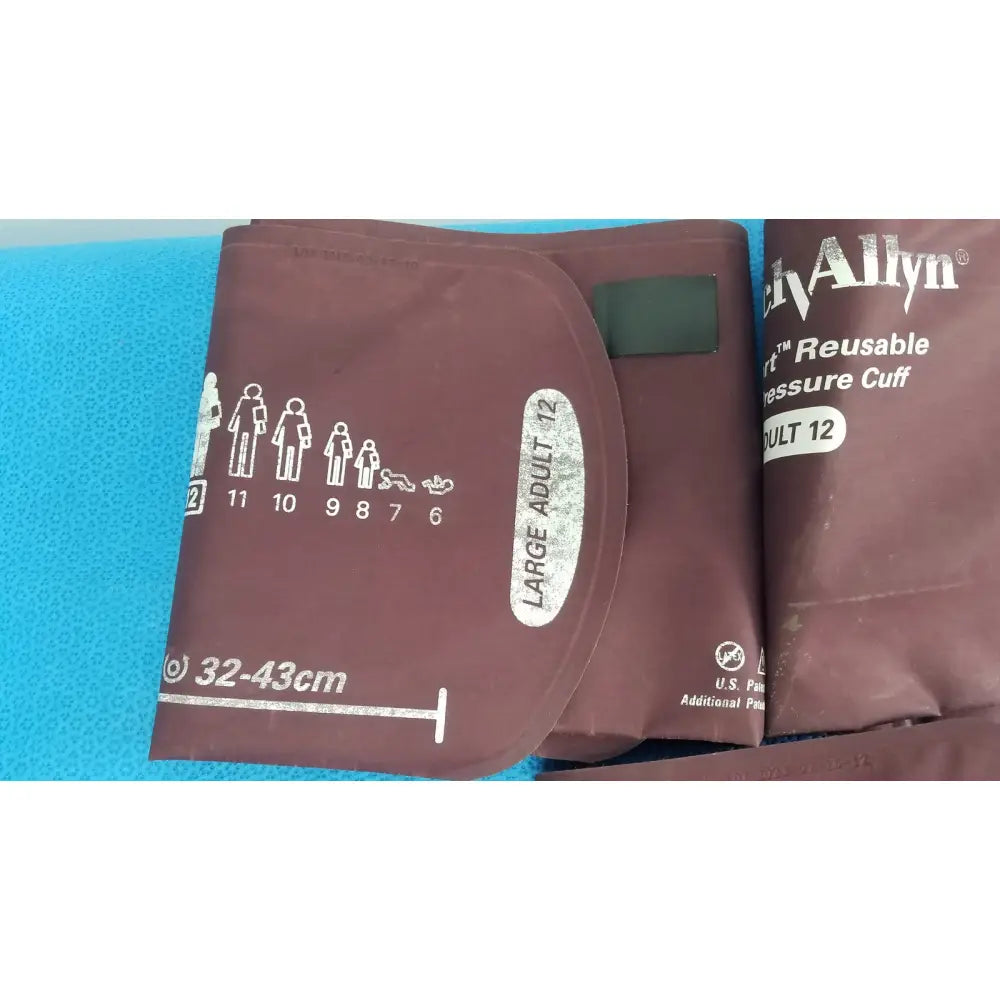 Brown vinyl welch allyn blood pressure cuff large adult 12 with sizing chart and brand name visible