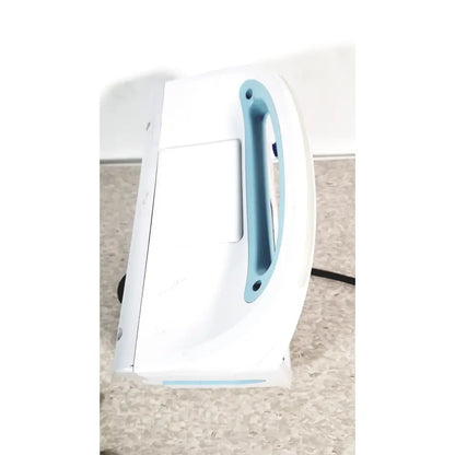 White and light blue robotic window cleaner with curved handle shown alongside welch allyn connex 6000 series vital signs monitor