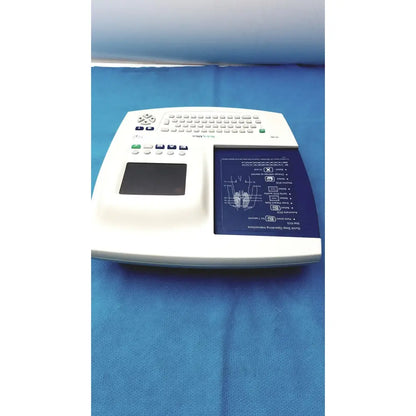 White welch allyn cp 200 ekg ecg monitor with built-in keyboard touchpad and illuminated blue diagnostic display screen