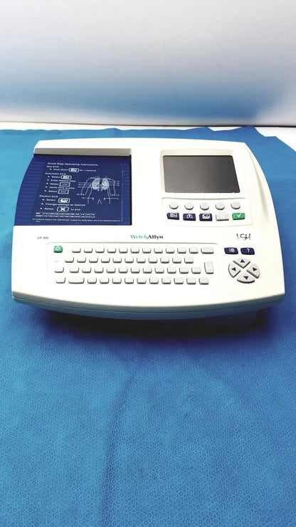 Welch allyn cp 200 ekg ecg monitor with white electrocardiogram machine and blue display screen with keyboard