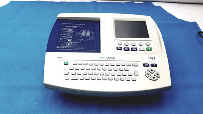 White welch allyn cp 200 ekg ecg monitor with dual screens keyboard and medical instruction display for clinical use