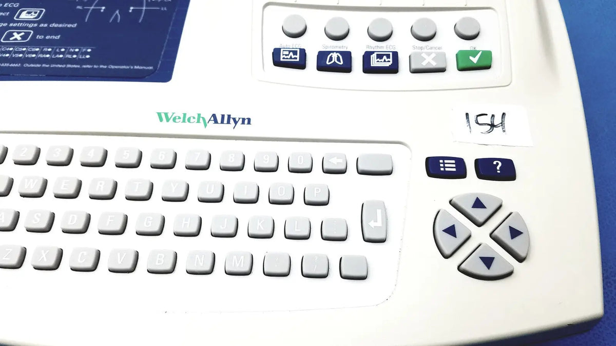 White welch allyn cp 200 ekg ecg monitor with built-in keyboard and function buttons for medical use