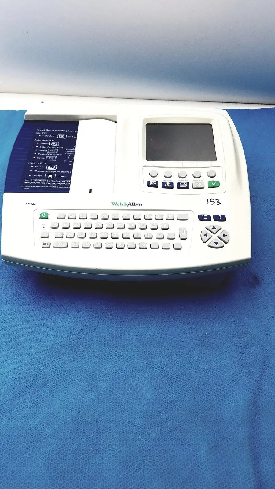 White Welch Allyn CP200 EKG cardiac monitor with small screen keypad and paper output slot for patient monitoring
