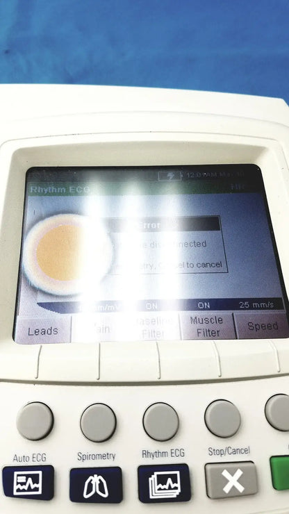 White welch allyn cp200 ekg monitor with touchscreen displaying rhythm ecg and physical buttons for spirometry and auto ecg