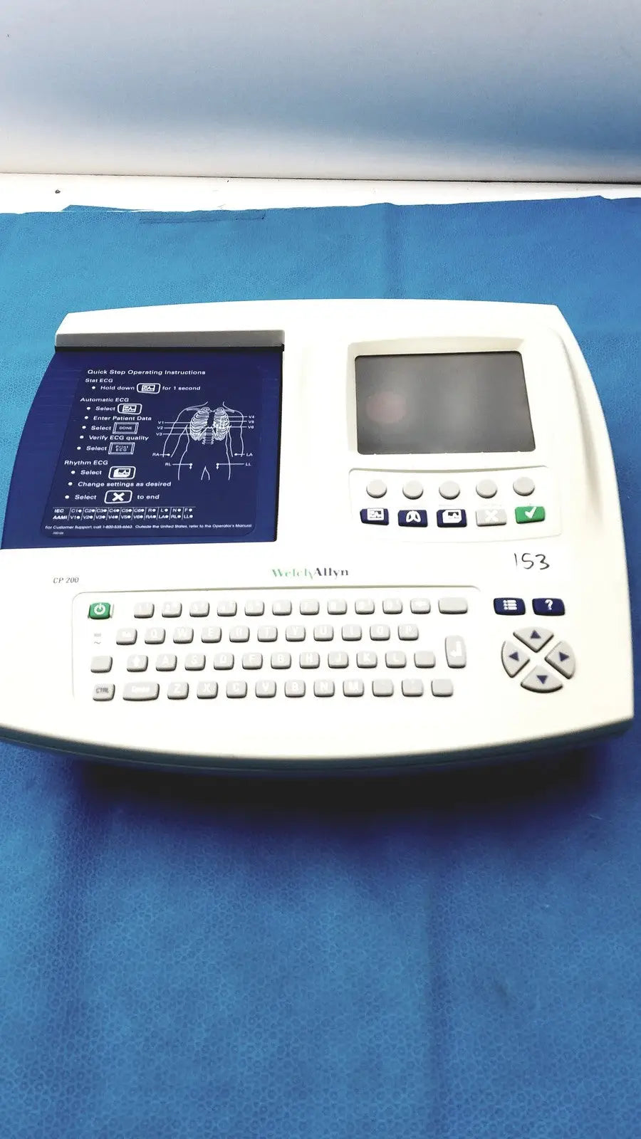 White welch allyn cp200 ekg monitor with small screen keypad and instructional display panel for cardiac use