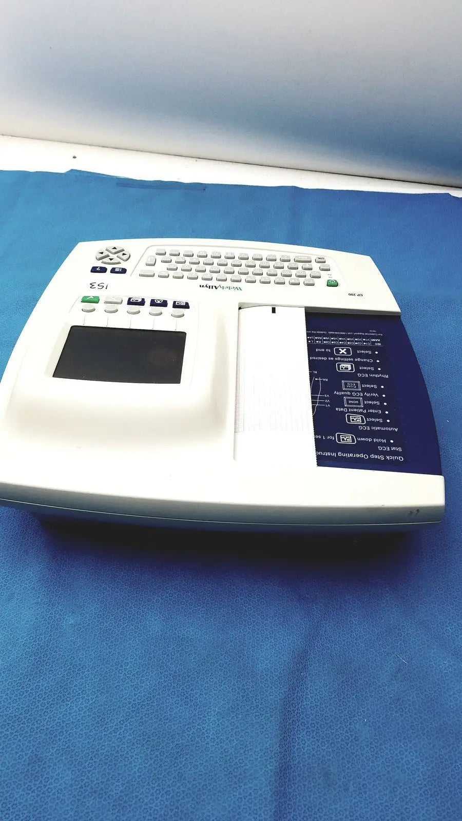 White ssi medtronic welch allyn cp200 ekg monitor with built-in keyboard touchpad and paper output slot
