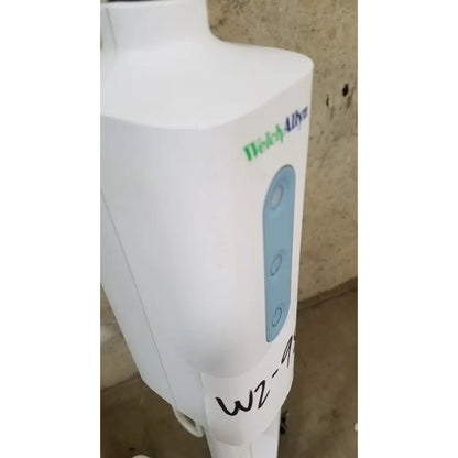 Welch Allyn GS 600 exam light with rolling stand featuring a white plastic water dispenser with blue control panel and medi-4you branding